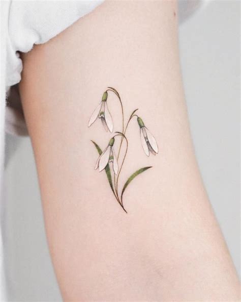 january birth flower tattoo|carnation snowdrop tattoo.